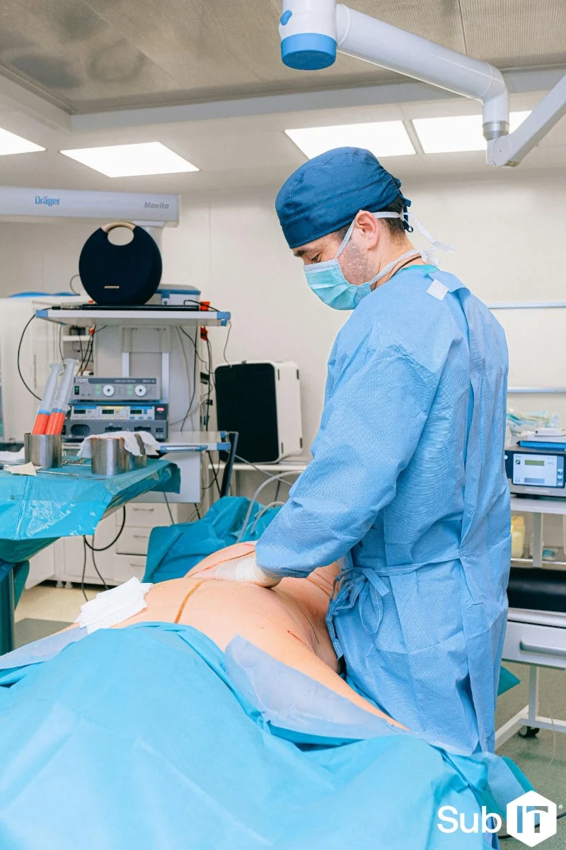 Surgeon performing procedure in hospital operating room