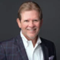 Smiling man wearing a suit jacket