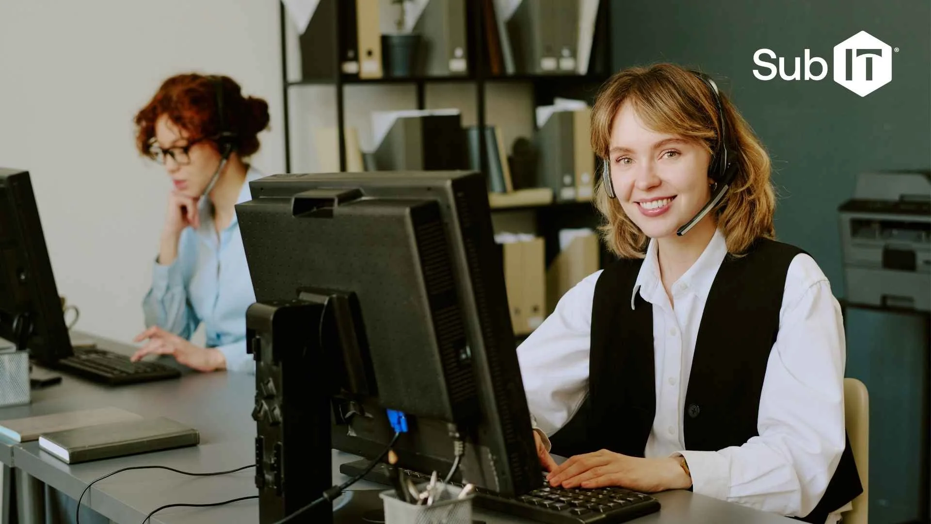 Customer support agents working in modern office