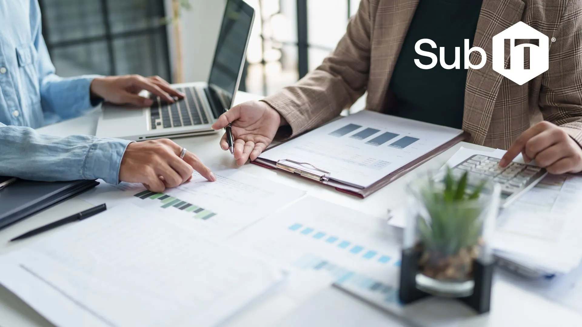 Business colleagues analyzing IT business plans for their small business