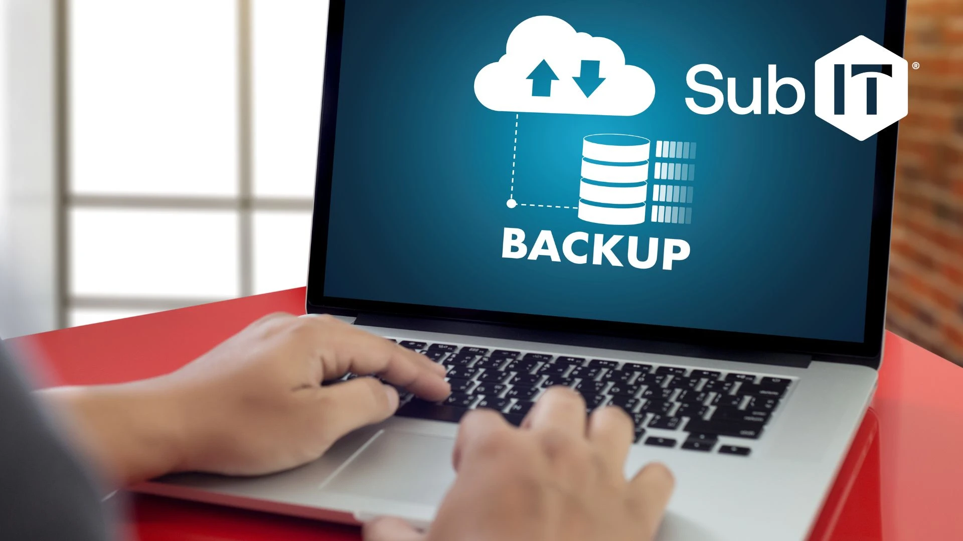 Person using laptop for cloud backup